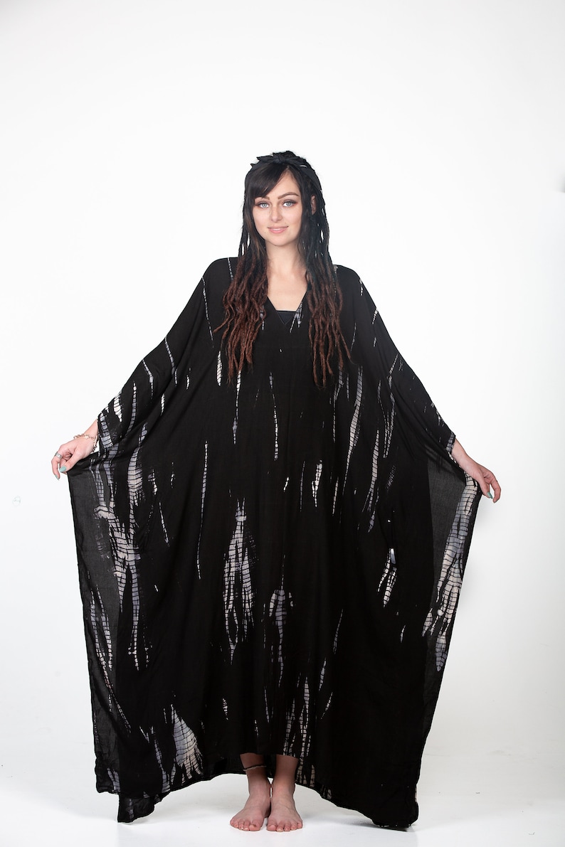 Black gothic kaftan dress with long sleeves for Halloween party.