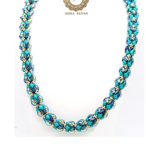 May include: A turquoise beaded necklace with gold accents. The necklace is in a twisted design and is displayed on a white background. The text "Lagoon Twist" is at the bottom of the image.