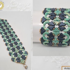 May include: A black and green beaded bracelet with gold accents. The bracelet is made with small, geometric beads and has a unique, intricate design.