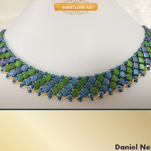 May include: A teal, green and gold beaded necklace with a geometric pattern. The necklace is called "Daniel Necklace".
