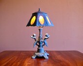 Old Stained Slag Glass and Metal Double Cherub Lamp, Eight Panel Orange Yellow Glass Metal Shade, Vintage Art Nouveau Accent Lighting Decor