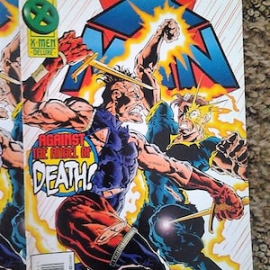 x-man comic issue 8//marvel comics//superheros//x-men deluxe//fine/vf condition//1995