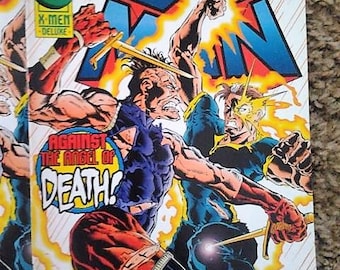 x-man comic issue 8//marvel comics//superheros//x-men deluxe//fine/vf condition//1995