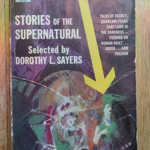May include: Vintage paperback book cover for "Stories of the Supernatural" by Dorothy L. Sayers. The cover features a colorful, abstract illustration with a figure and text. The book is from "The Omnibus of Crime."