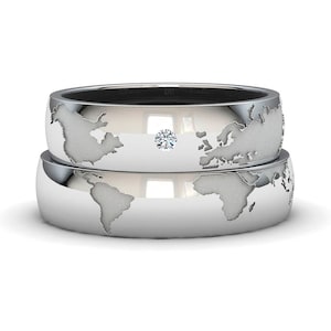 Bagues de carte du monde en argent avec un diamant. Bagues pour mariage, anniversaire, fiançailles ou cadeau. Livraison gratuite.