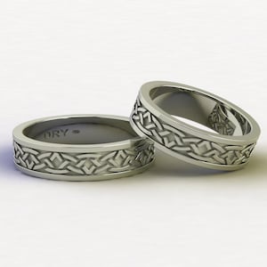 Celtic Knot Rings in 18k white gold. Engagement, wedding, anniversary, or gift rings. Free shipping.