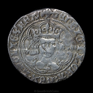 May include: Silver coin with a portrait of a crowned monarch on the obverse. The coin has a beaded border and the inscription "HENRICVS VII REX ANGLIE" around the edge.