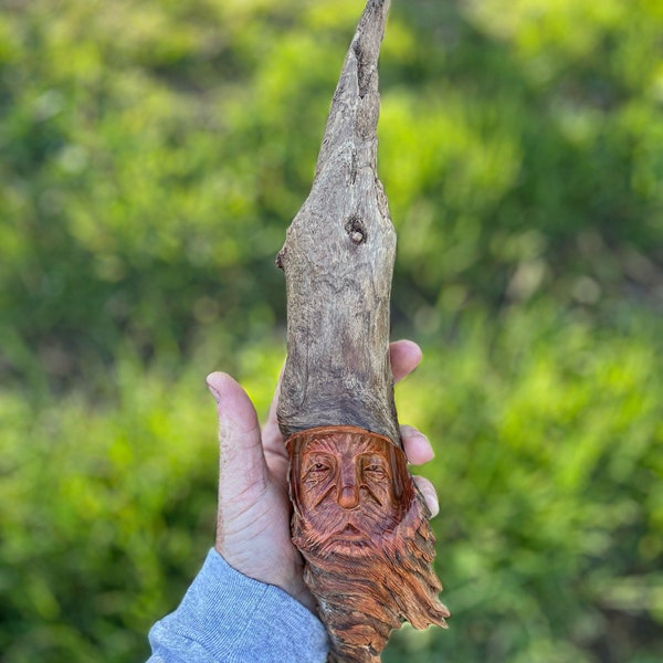 Woodspirit carved in a pine knot