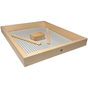 May include: A wooden frame with a mesh screen inside. There are three wooden pieces, a square and two rectangular pieces, inside the frame.
