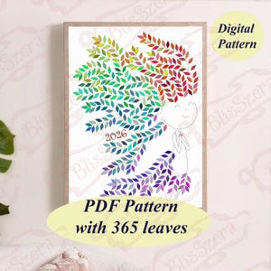 Può includere: Una stampa di modello digitale incorniciata con un'illustrazione stravagante di una figura con capelli colorati a forma di foglie. L'opera d'arte include l'anno 2026 e il testo "PDF Pattern with 365 leaves" e "Digital Pattern". Le foglie sono in tonalità di verde, blu, viola, rosso e giallo.