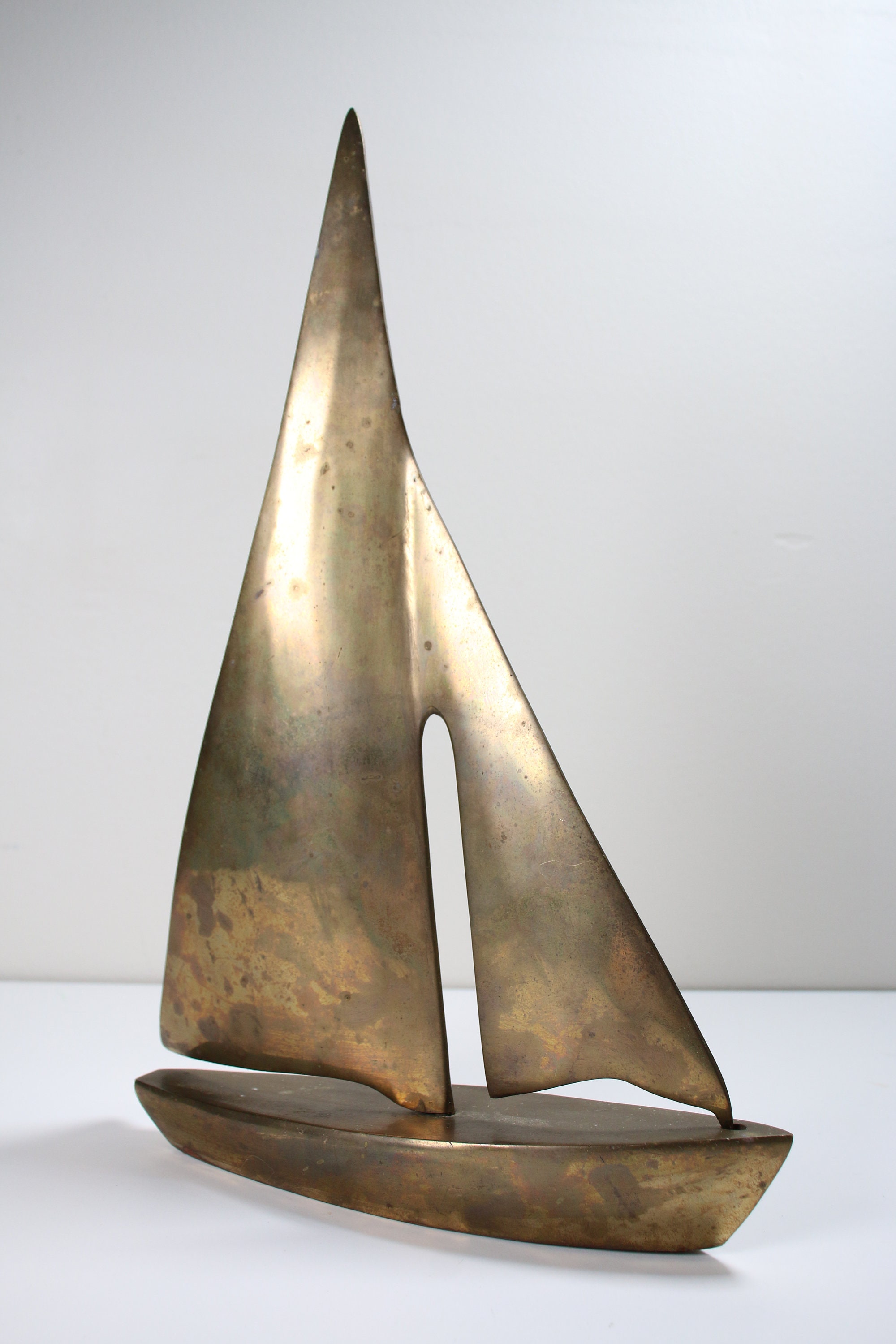 vintage brass sailboats