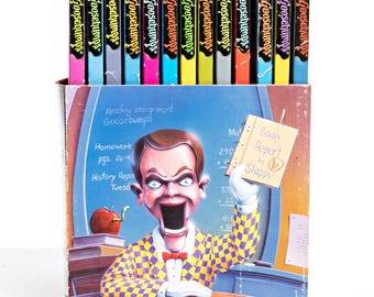 Lot Of 13 Goosebumps Scholastic Books in Book Holder