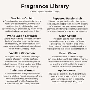 The image is a collection of scents from the Fragrance Library, each with a unique aroma and description. The scents include Sea Salt + Orchid, Peppered Passionfruit, White Sage + Lavender, Clean Cotton, Vanilla + Cinnamon, and Ocean Water.