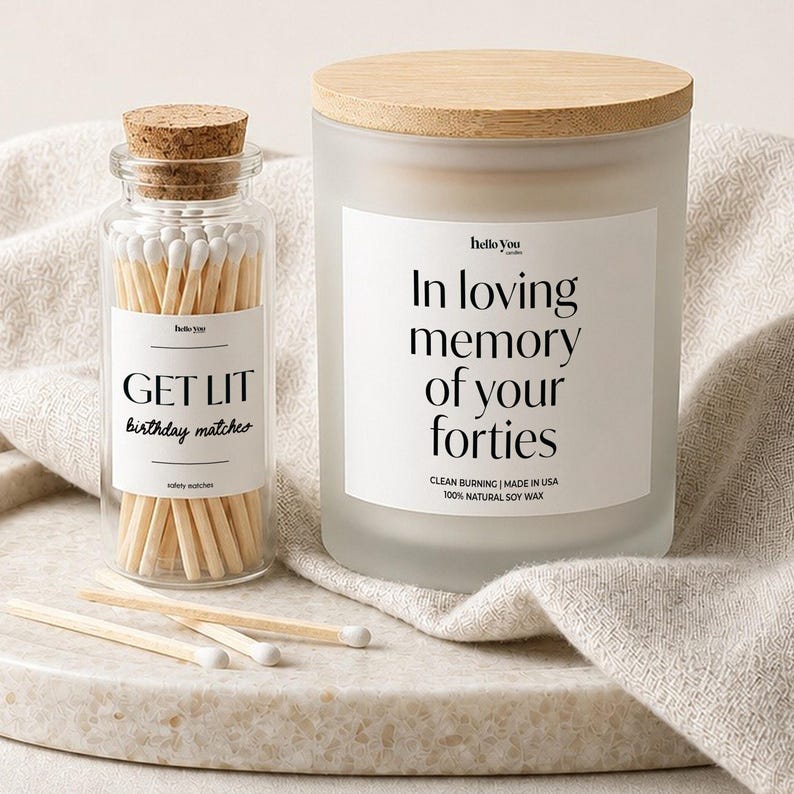 a candle and a matchbox holder, both with a label that reads "In loving memory of your forties".