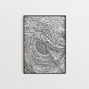 May include: Black and white abstract art print with a circular pattern resembling tree rings. The print is framed in a black frame.