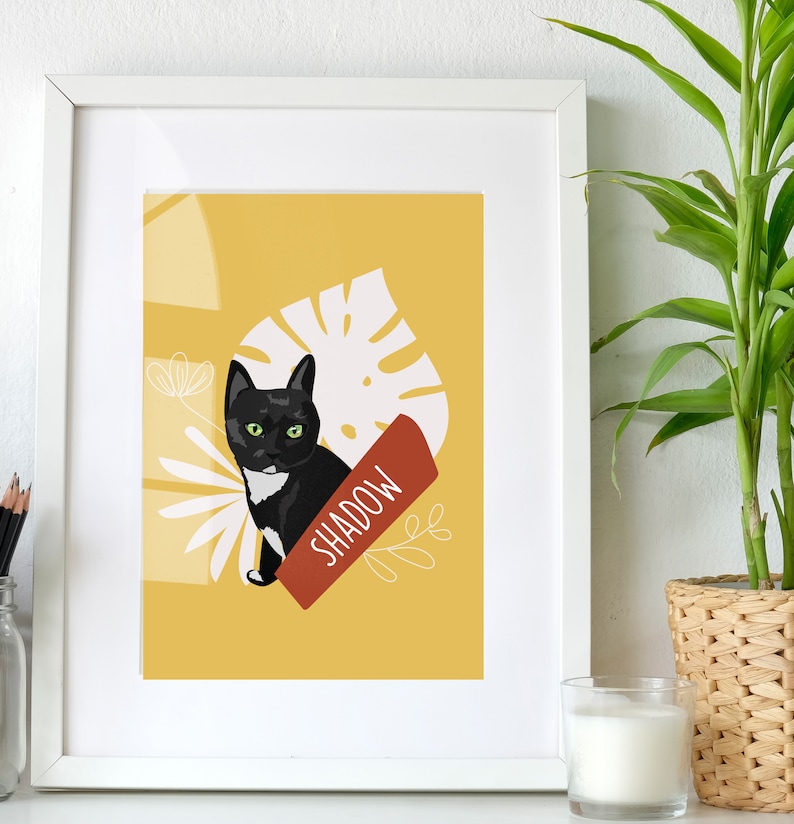 May include: A black and white cat with green eyes sits on a yellow background with a white leaf and the word "SHADOW" in red.