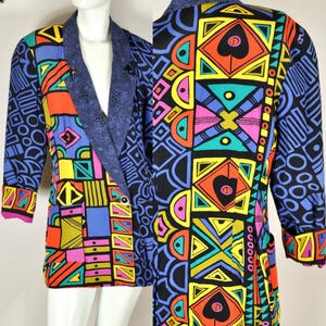 May include: A vibrant, geometric-patterned blazer in a kaleidoscope of colors, including blue, orange, yellow, and pink. The blazer features a notched lapel and three-quarter sleeves, showcasing a bold, artistic design.