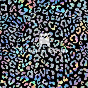 May include: A black background with a white and iridescent leopard print pattern. The print has a glittery effect.