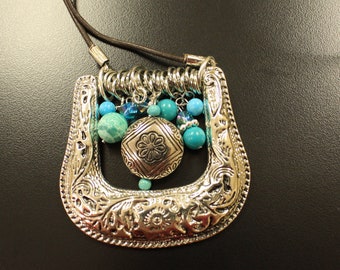 Cowgirl bling belt buckle necklace with turquoise colored and aqua glass dangles,  26-inch necklace on brown leather cord