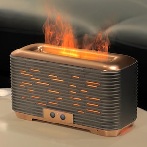 May include: A dark grey and copper-toned aromatherapy diffuser with a flame effect. The rectangular device has a ribbed design with horizontal orange lights and two control buttons. The top has a copper-coloured rim and emits a simulated flame.