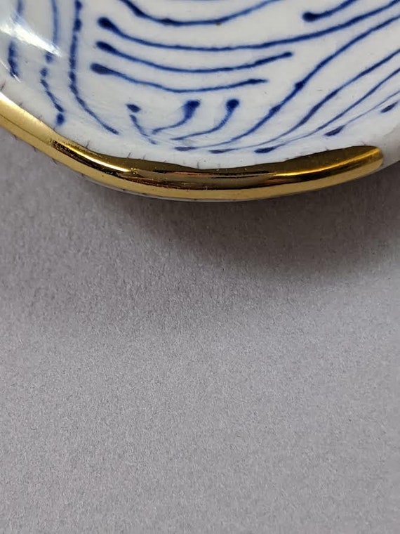 porcelain jewelry dish with cobalt blue design and 22k gold rim