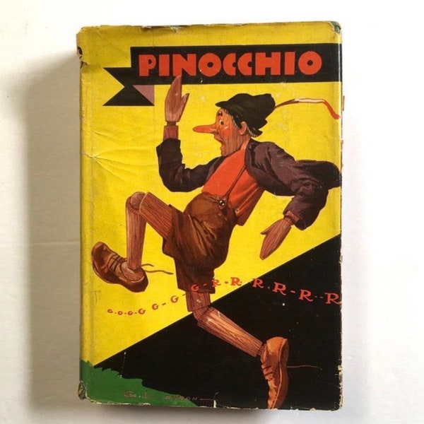 Pinocchio hardcover with dust jacket from Saalfield, 1924. Children’s literature classic.