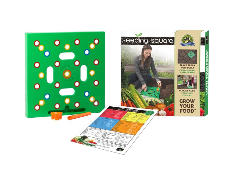 May include: A green Seeding Square gardening tool with colored planting guides and a box that says "seeding square" and "Grow Your Food". Includes a planting guide and orange tools.