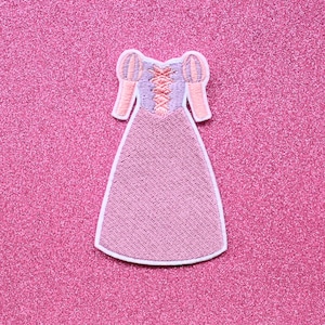 May include: A pink embroidered patch of a princess dress with puffed sleeves and a lace-up bodice.