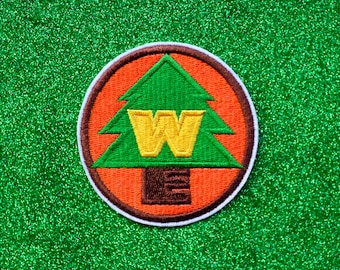 WE Badge Embroidered Iron On Patch