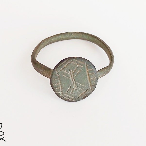 Big Bronze ring with a geometric pattern. Rare antique ring, ancient artifact. Medieval original jewelry.