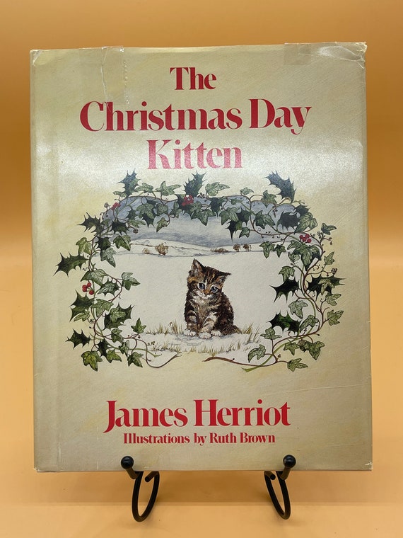 The Christmas Day Kitten by James Herriot with illustrations by Ruth Brown 1986 St Martins Press.