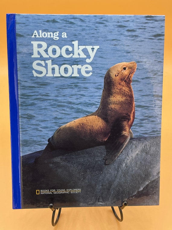 Books for Young Explorers Along a Rocky Shore by National Geographic 1987 hardcover Childrens Books for kids gift animal books young readers