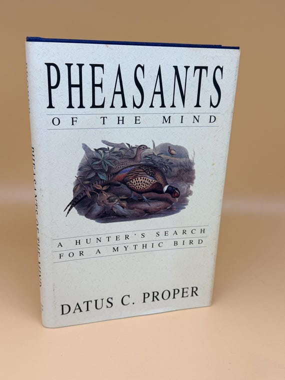 Pheasants of the Mind A Hunter's Search for a Mythic Bird by Datus C. Proper SIGNED copy 1994 Wilderness Adventure Press