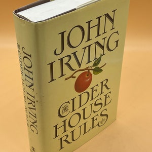 Fiction Novels The Cider House Rules by John Irving  First Edition Third Printing 1985 William Morrow Publishing Used First Edition Books