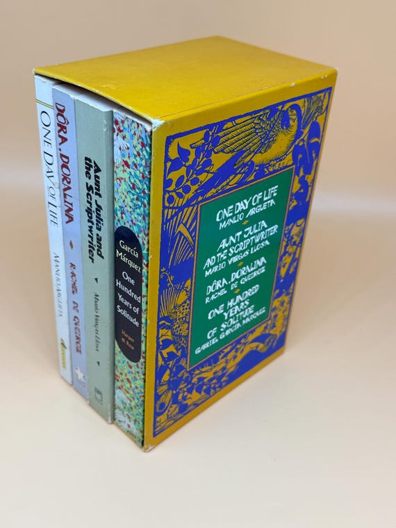 Boex set of 4 paperbacks; One Day of Life, One Hundred Yrs of Solitude, Aunt Julia & The Scriptwriter, Dora Doralina Latino fiction writers
