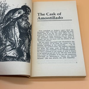 May include: An open book displaying the title "The Cask of Amontillado" on the right-hand page. The left page shows a black and white illustration. The text on the right discusses the story's themes and publication details.