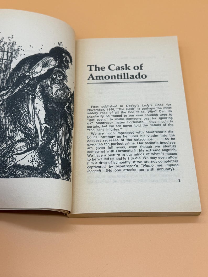 May include: An open book displaying the title "The Cask of Amontillado" on the right-hand page. The left page shows a black and white illustration. The text on the right discusses the story's themes and publication details.