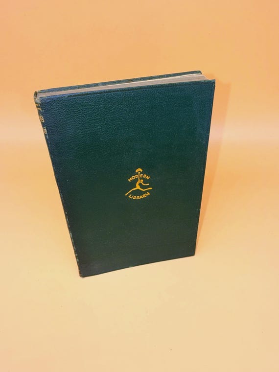 Candide by Voltaire circa 1920's Modern Library leatherette binding Classic Philosophical Literature Rare books