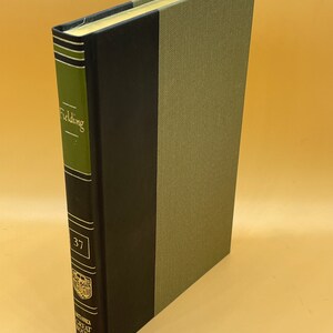 May include: A green and black hardcover book with the title "Fielding" and the number "37" on the spine. The book is part of the "Great Books" series.