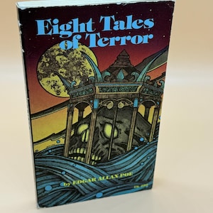 May include: A vintage paperback book titled "Eight Tales of Terror" by Edgar Allan Poe. The cover features a dark, illustrated scene with a skull, a full moon, and stylized waves. The title is in blue text.