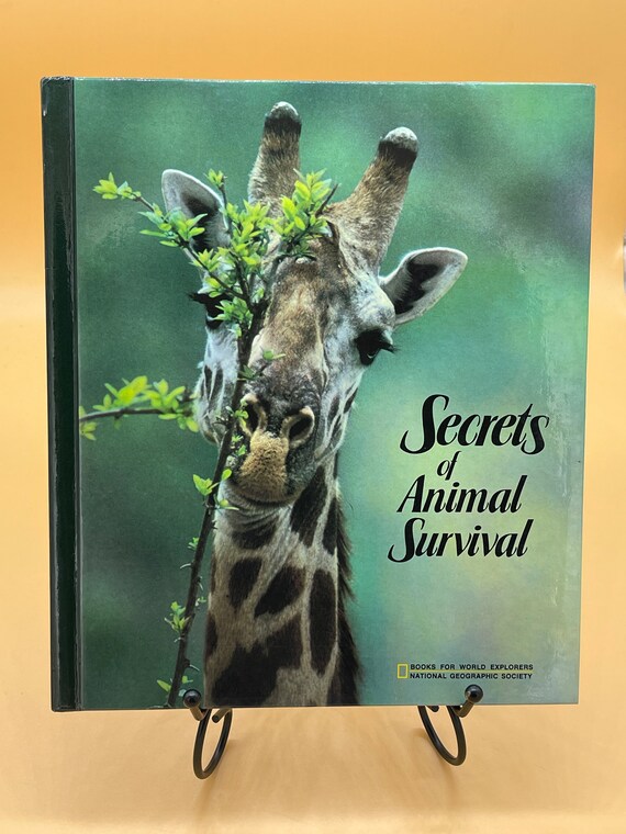 Childrens Books Secrets of Animal Survival by National Geographic Books for Young Explorers Series 1985 hardcover Educational books for kids