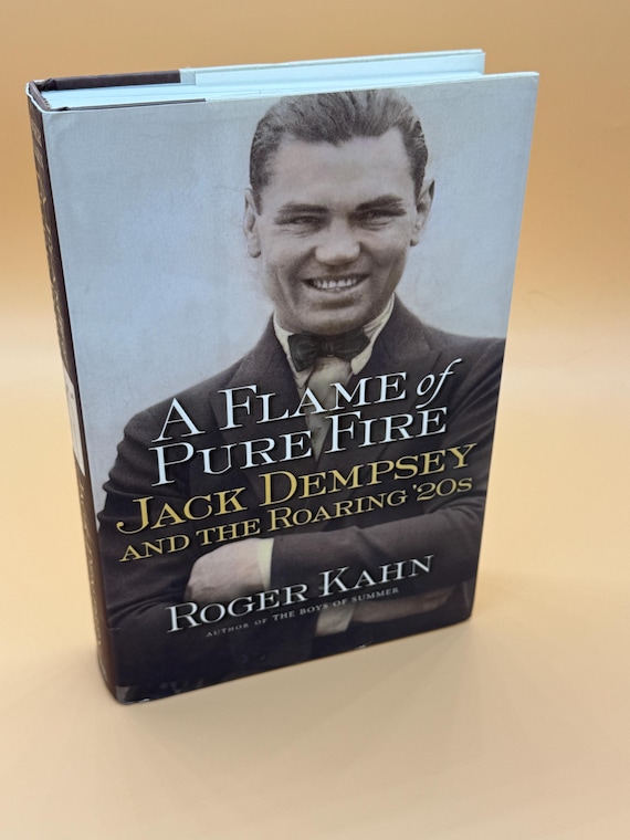 A Flame of Pure Fire Jack Dempsey and The Roaring '20s by Roger Kahn 1999 Harcourt Brace Publishing Biography books Boxing history biography