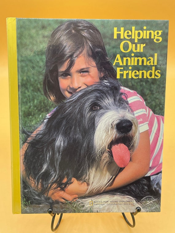 Books for Young Explorers Helping Our Animal Friends by National Geographic 1987 hardcover Childrens Books for Kids Gift Books Animal Books