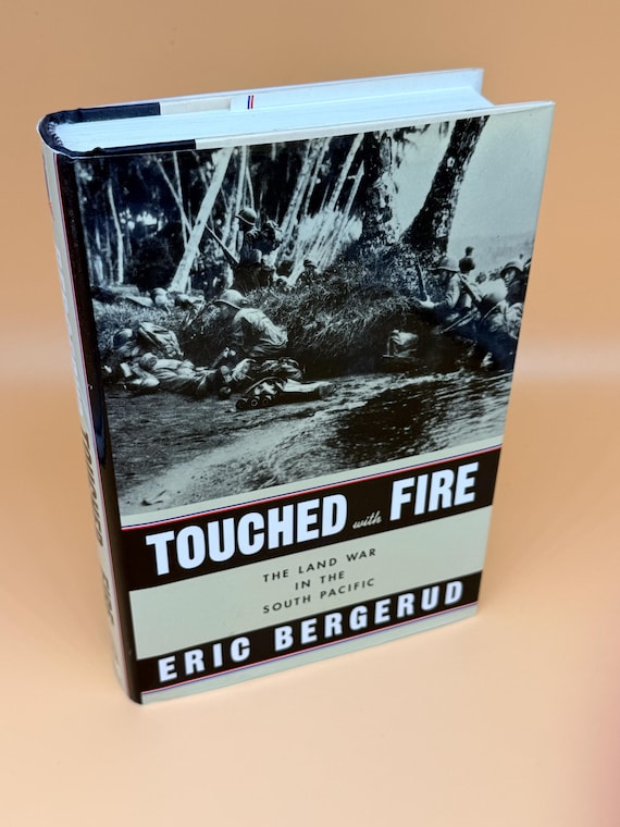 Touched with Fire The Land War in the South Pacific by Eric Bergerud 1996 Viking Press Military history books World War Two books