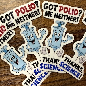 May include: A collection of stickers featuring a cartoon syringe. The stickers display the phrases "Got Polio? Me Neither!" and "Thanks, Science!" in black and blue text. The syringe is light blue with a smiling face.