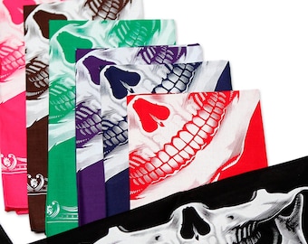 May include: A set of ten skull bandanas in various colors, including pink, brown, green, purple, blue, and red. The bandanas feature a white skull graphic with a toothy grin.