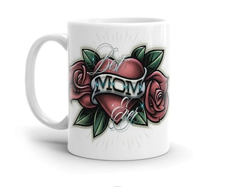 May include: White ceramic mug with a colorful tattoo-style design featuring a heart with the words "Best Mom Ever" and two roses.