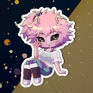 May include: A pink-haired anime character with a white shirt and purple and green pants. The character is sitting with one leg crossed over the other and is making a peace sign with their hand.