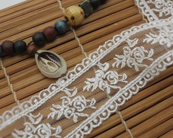 White cotton lace ribbon with flowers embroidered on mesh lace, 1 1/2 inches wide