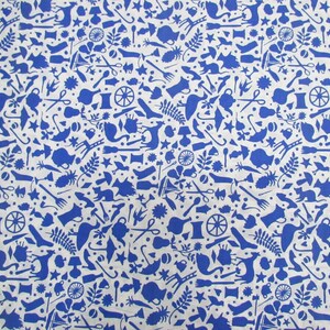 May include: A white fabric with a repeating pattern of blue silhouettes. The silhouettes include a variety of objects, such as birds, flowers, teapots, and other household items.